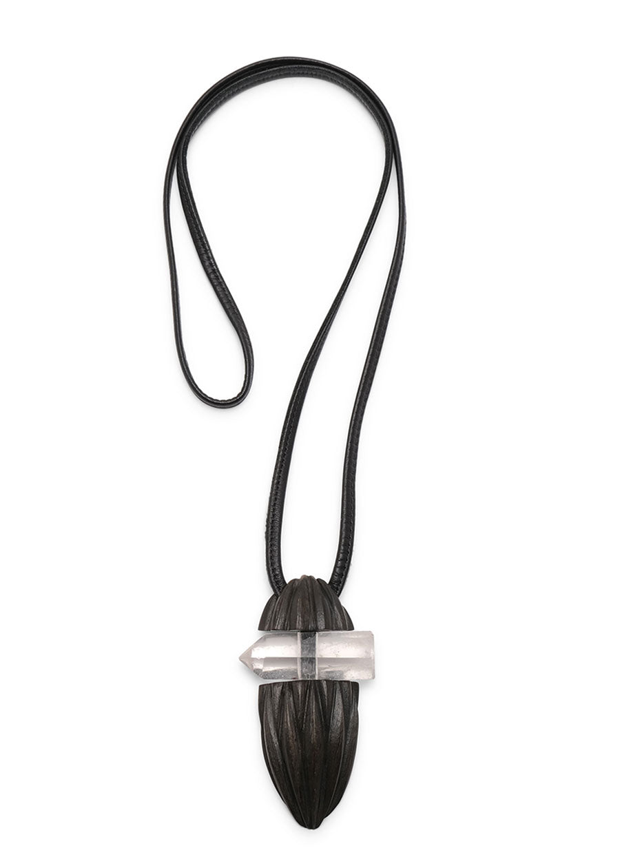 carved kamagong wood oval pendant with rough crystal insert