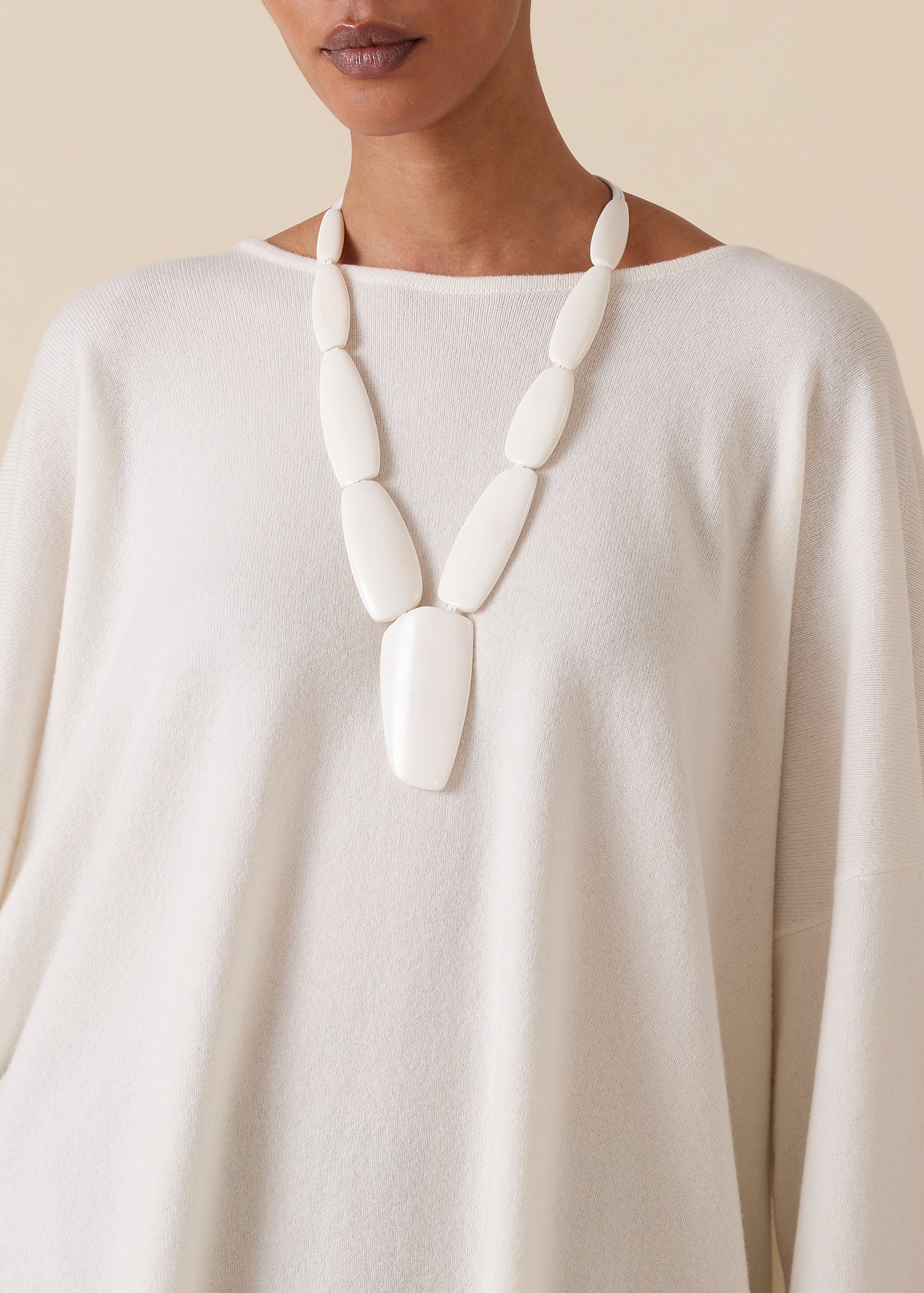 mid length segmented white bone necklace