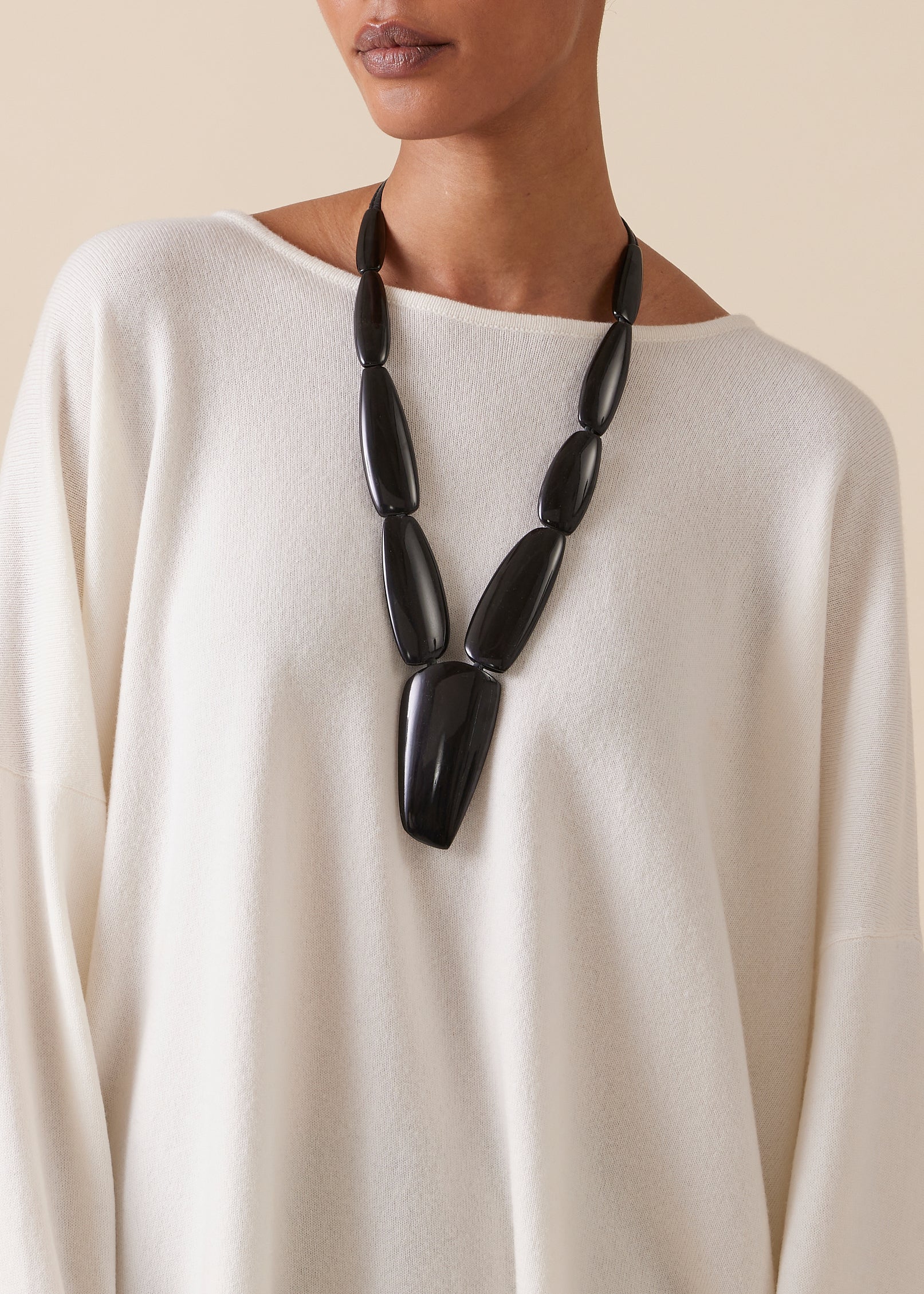 mid length segmented black horn necklace