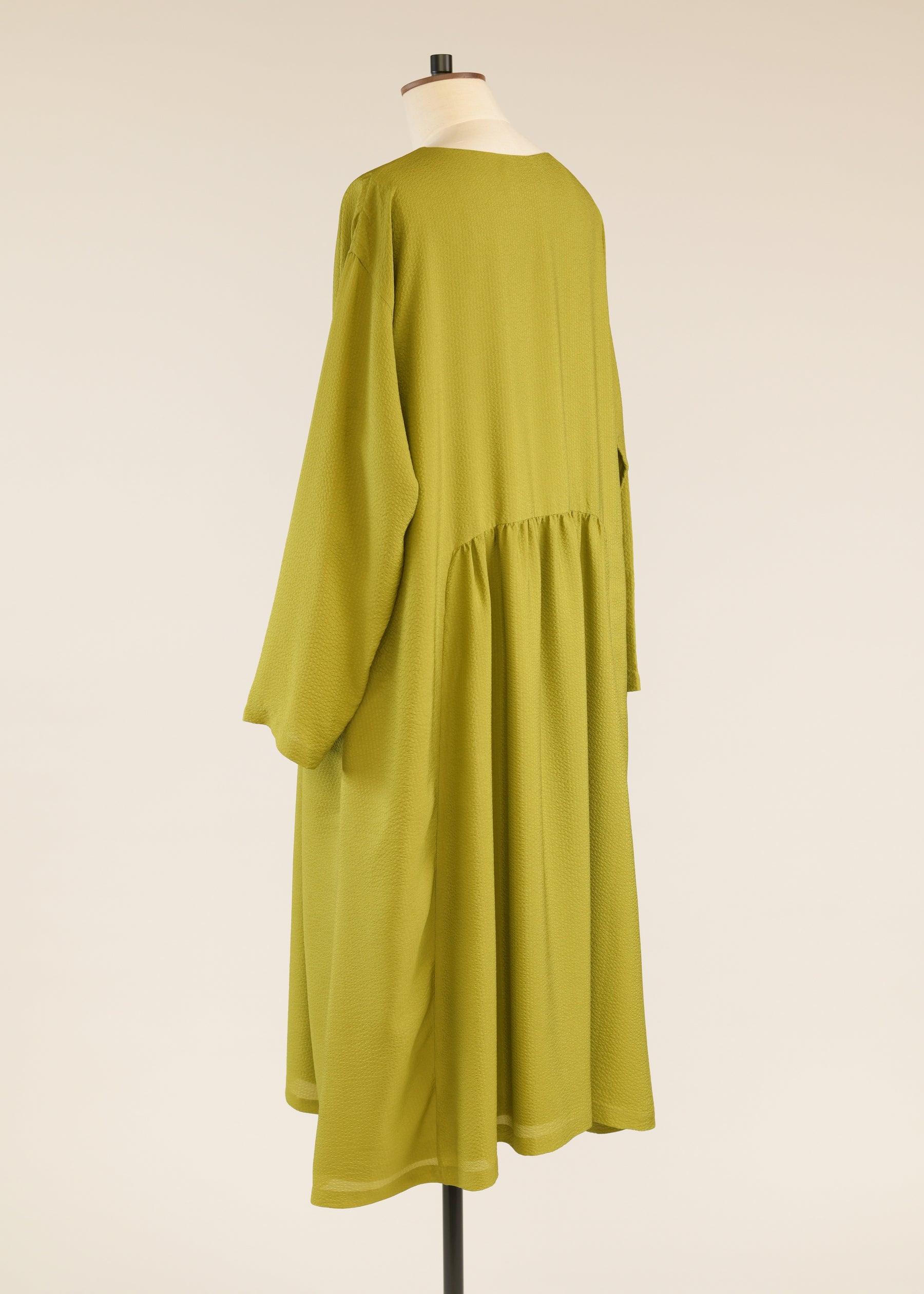 silk a-line round neck dress with 'pleated panels'