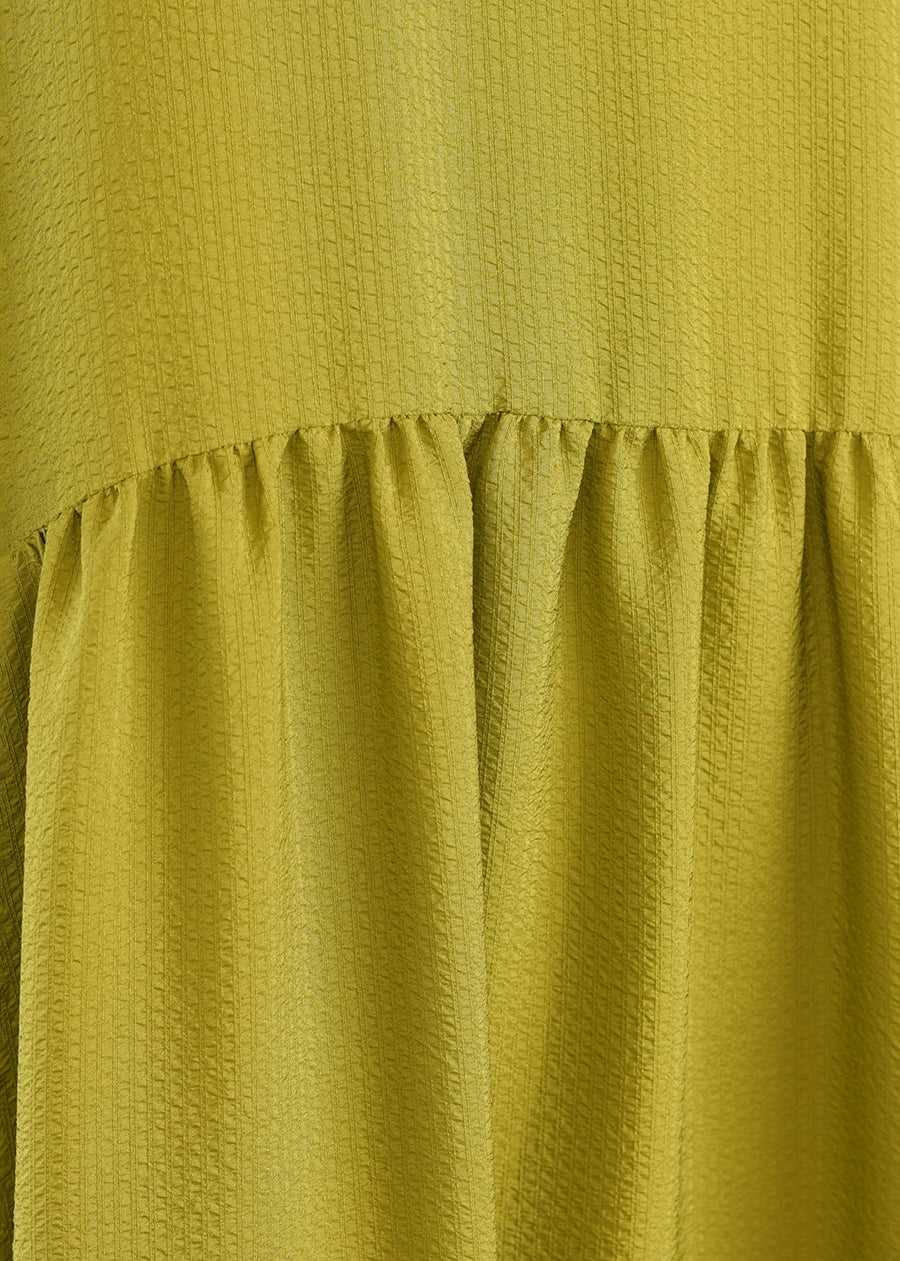silk a-line round neck dress with 'pleated panels'