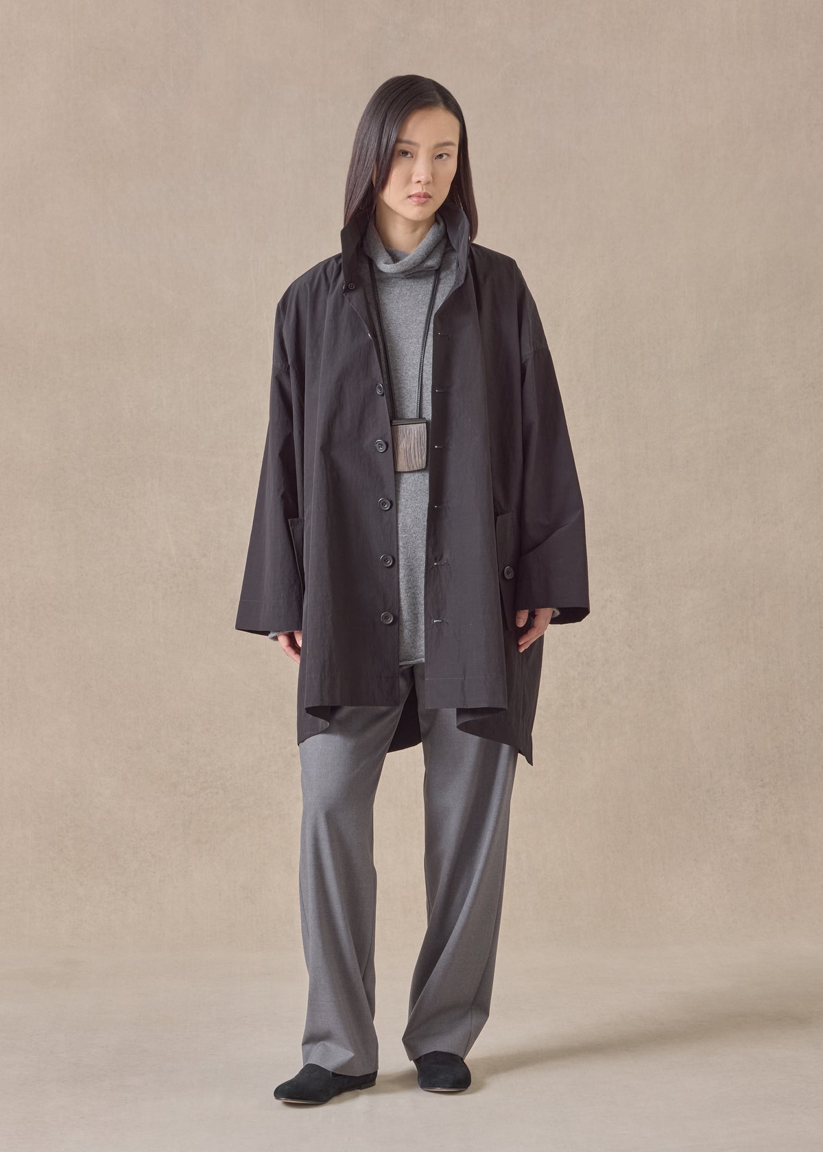 cotton mix smaller front larger back high neck raincoat with button away hood - long plus