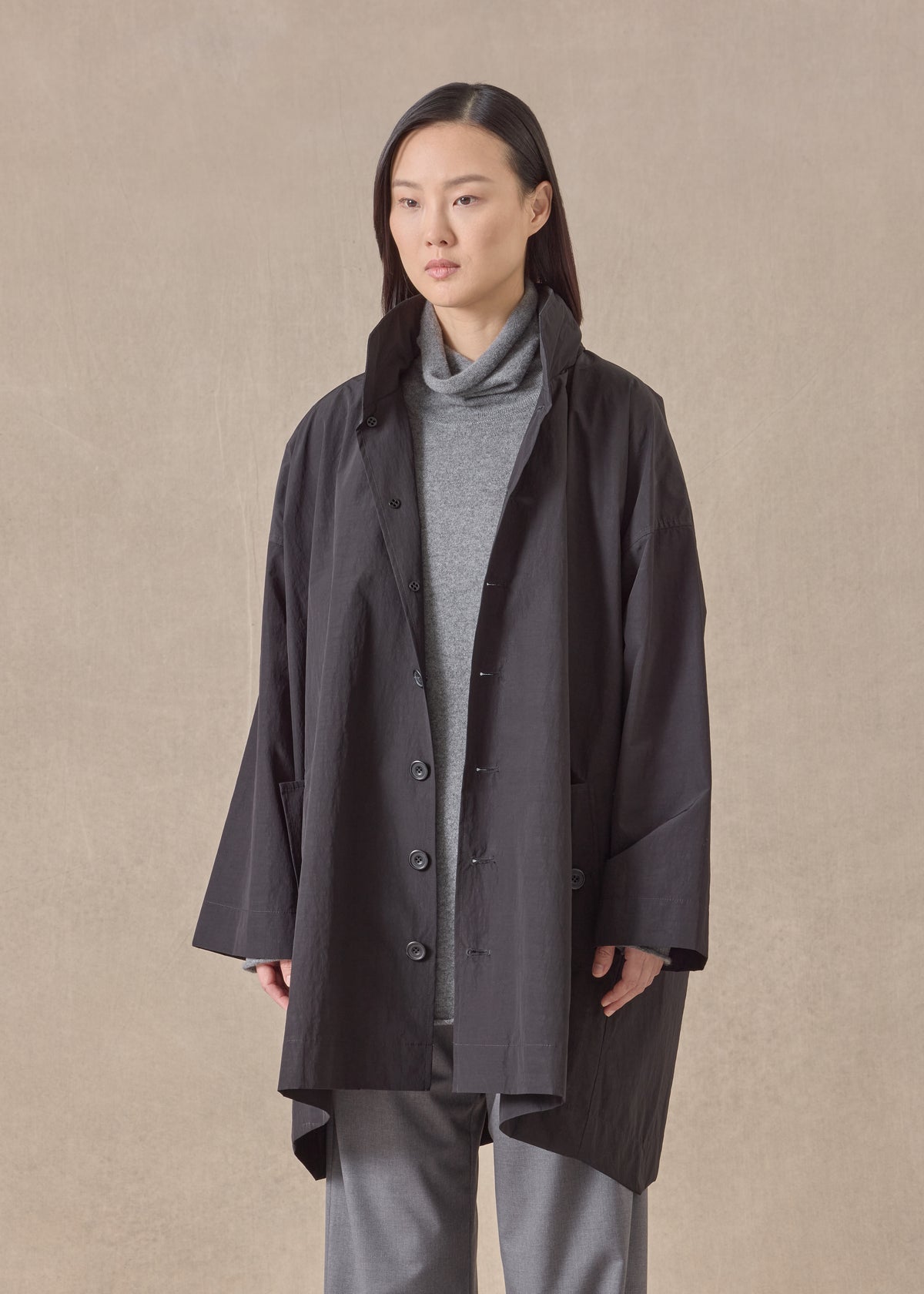 cotton mix smaller front larger back high neck raincoat with button away hood - long plus