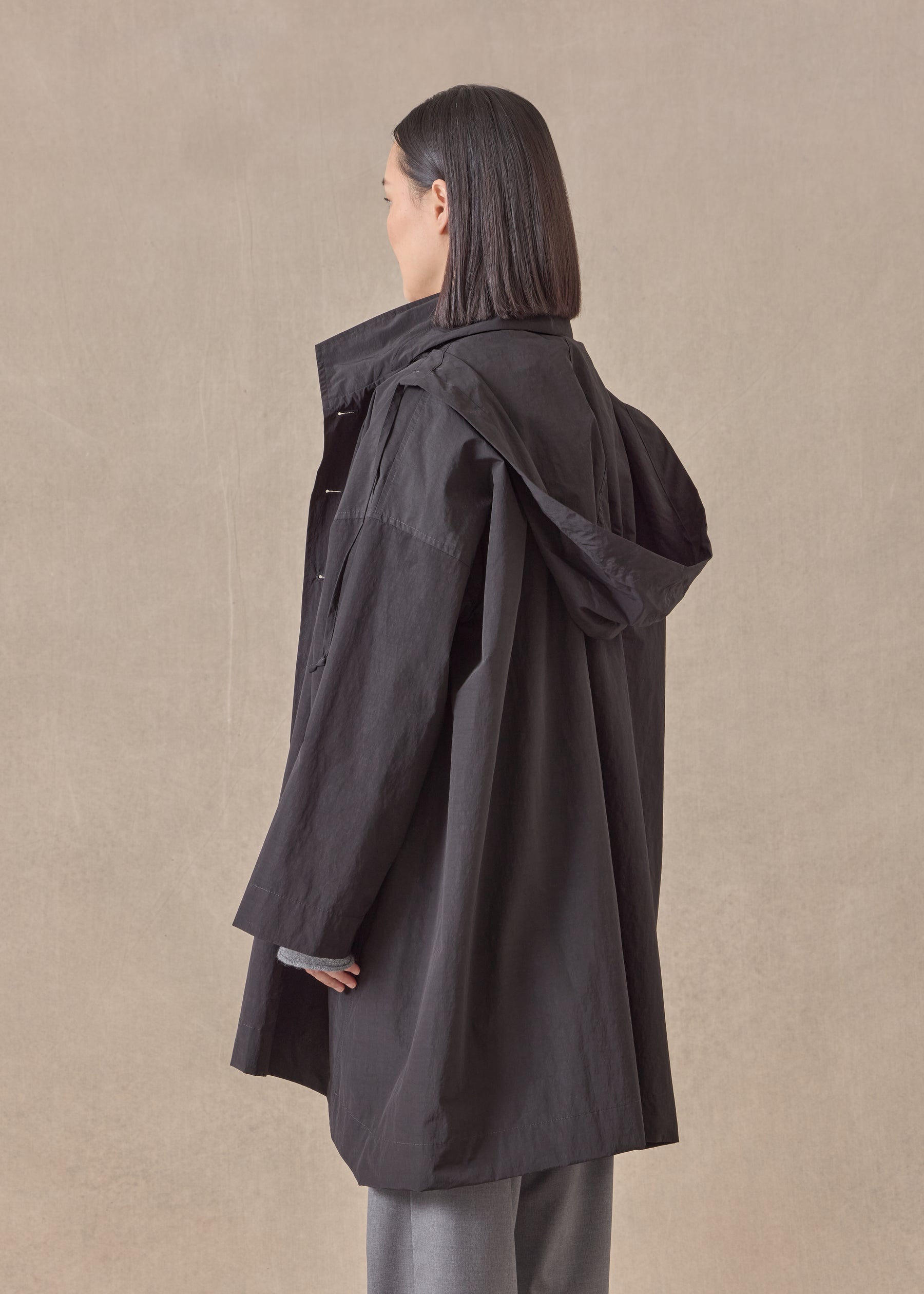 cotton mix smaller front larger back high neck coat with button away hood - long plus