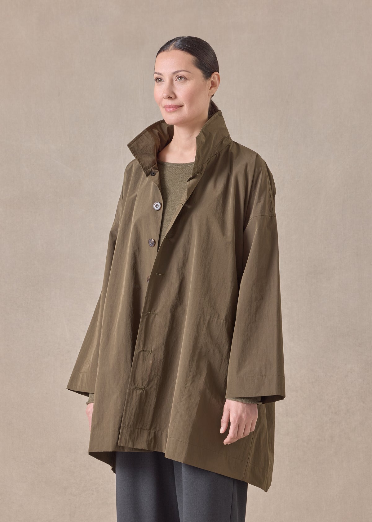 cotton mix smaller front larger back high neck raincoat with button away hood - long plus