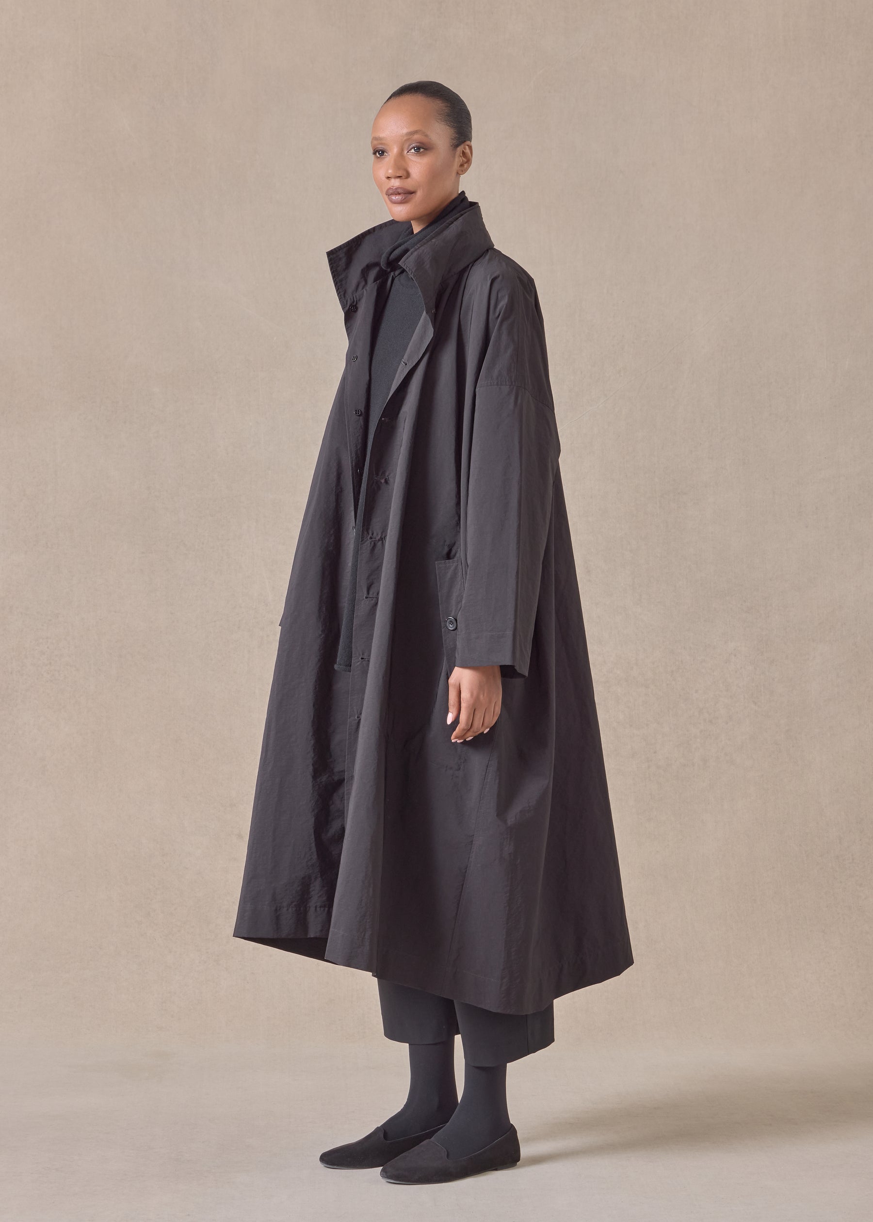 cotton mix smaller front larger back high neck coat with button away hood - full length