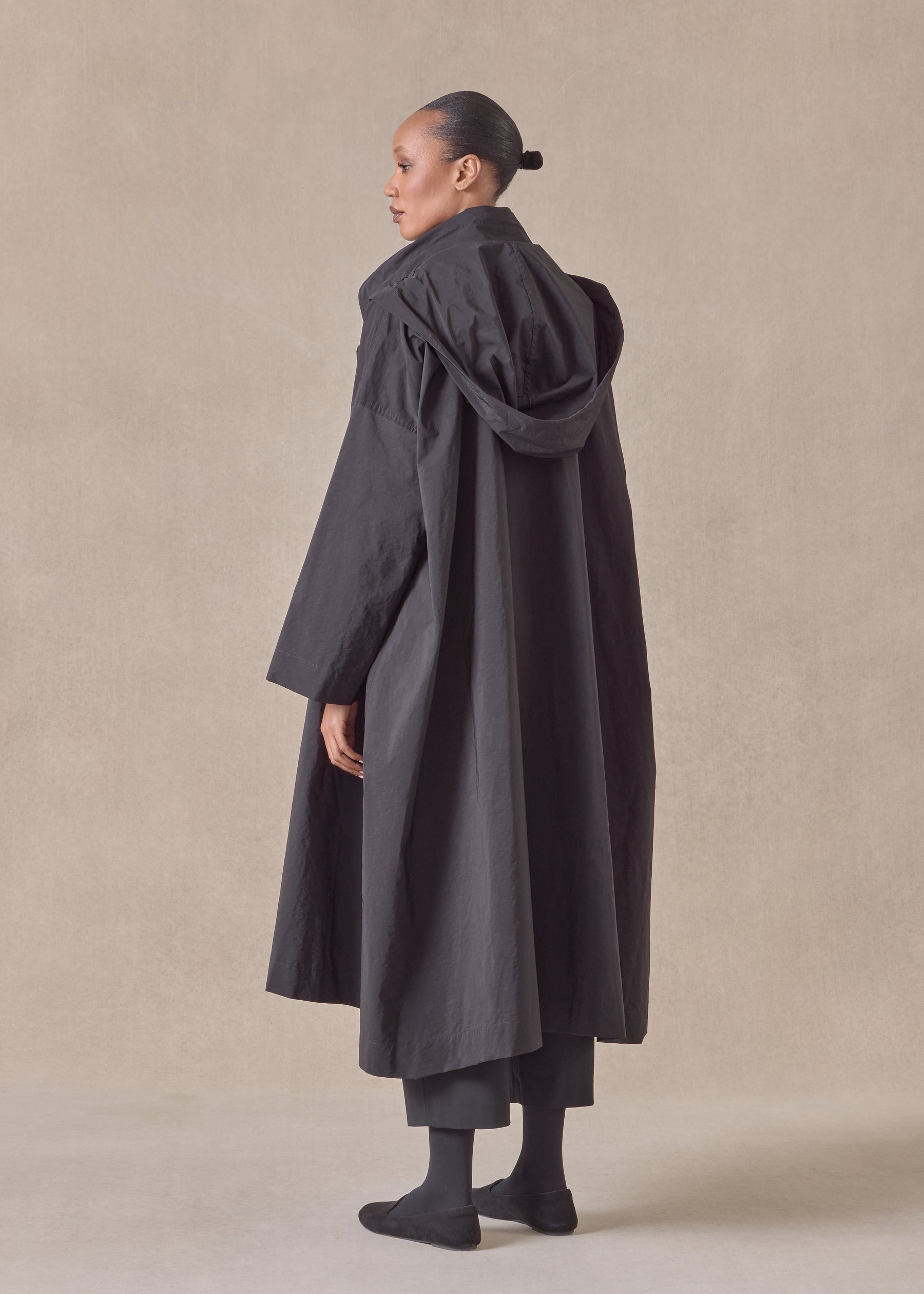 cotton mix smaller front larger back high neck coat with button away hood - full length