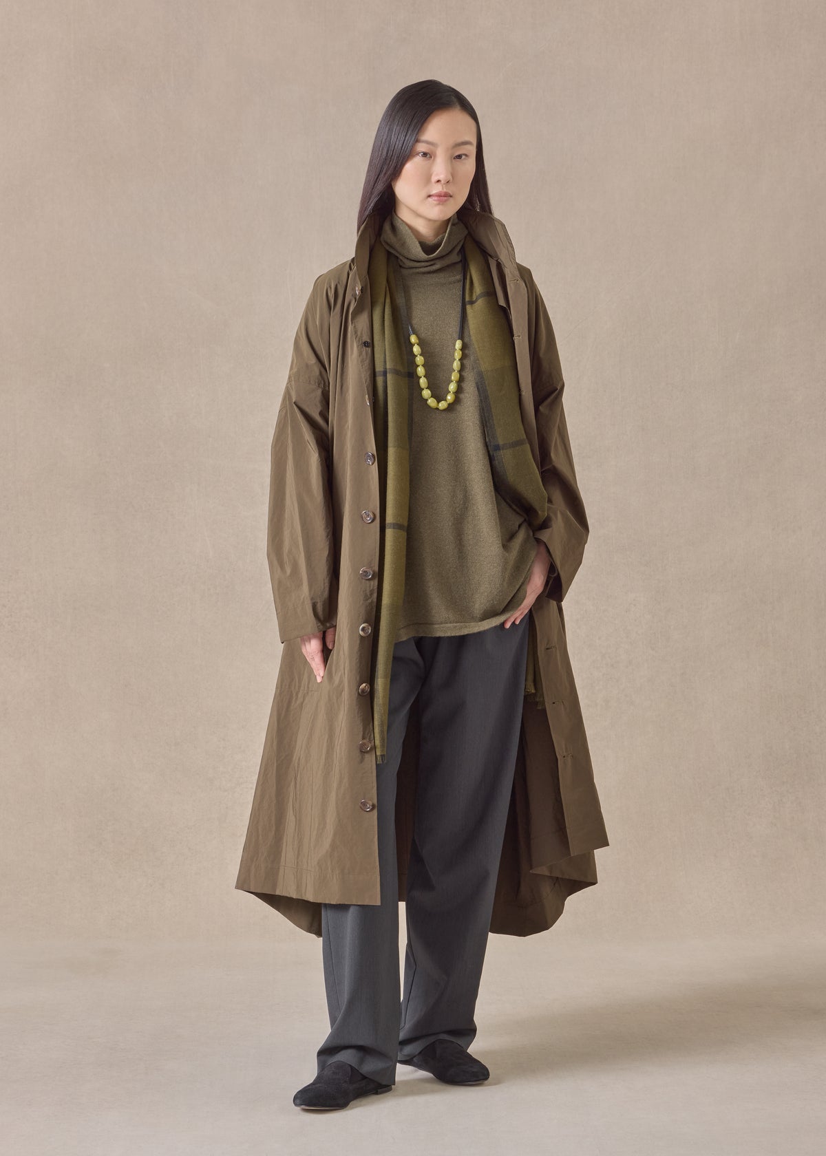 cotton mix smaller front larger back high neck raincoat with button away hood - full length