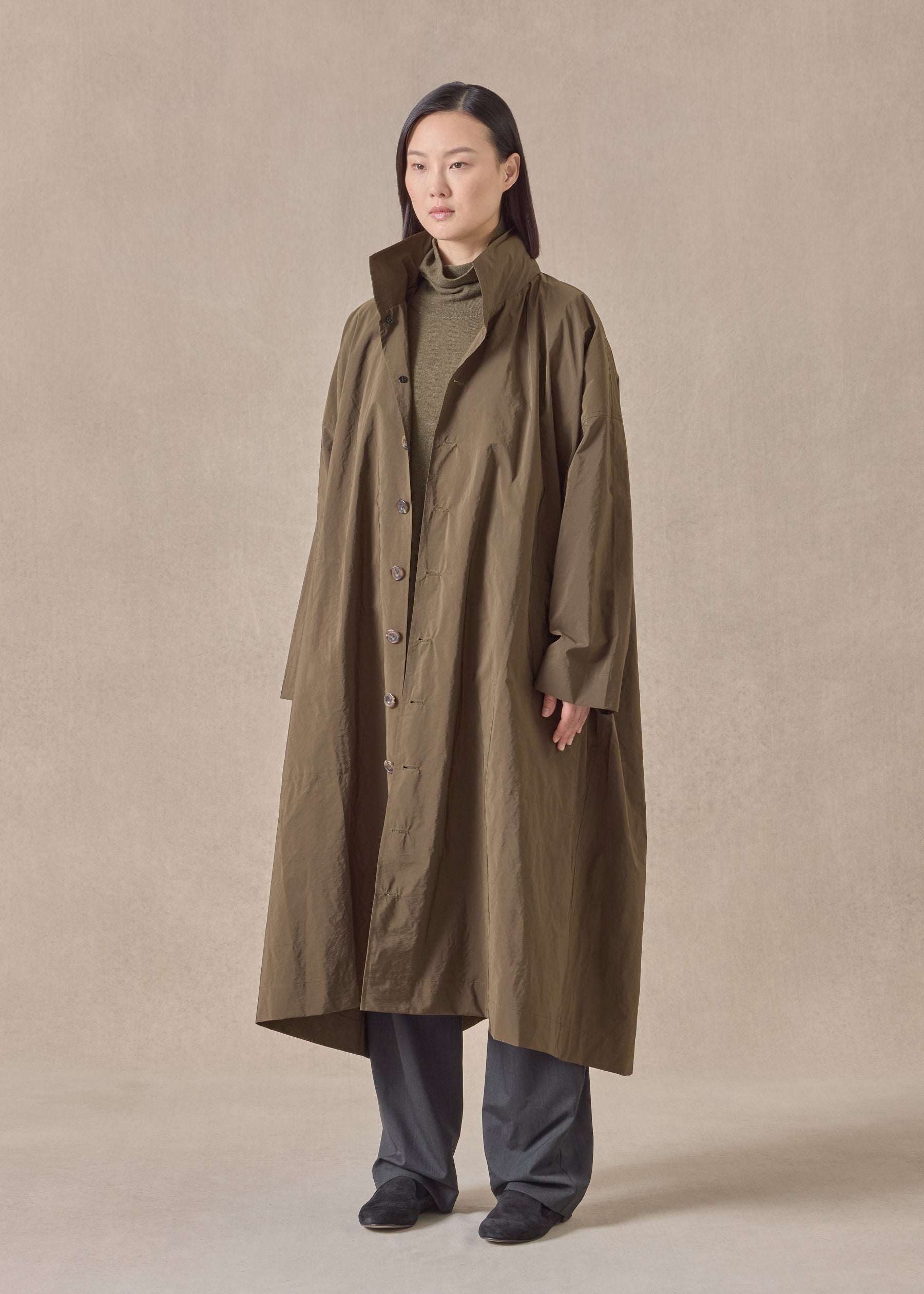 cotton mix smaller front larger back high neck coat with button away hood - full length