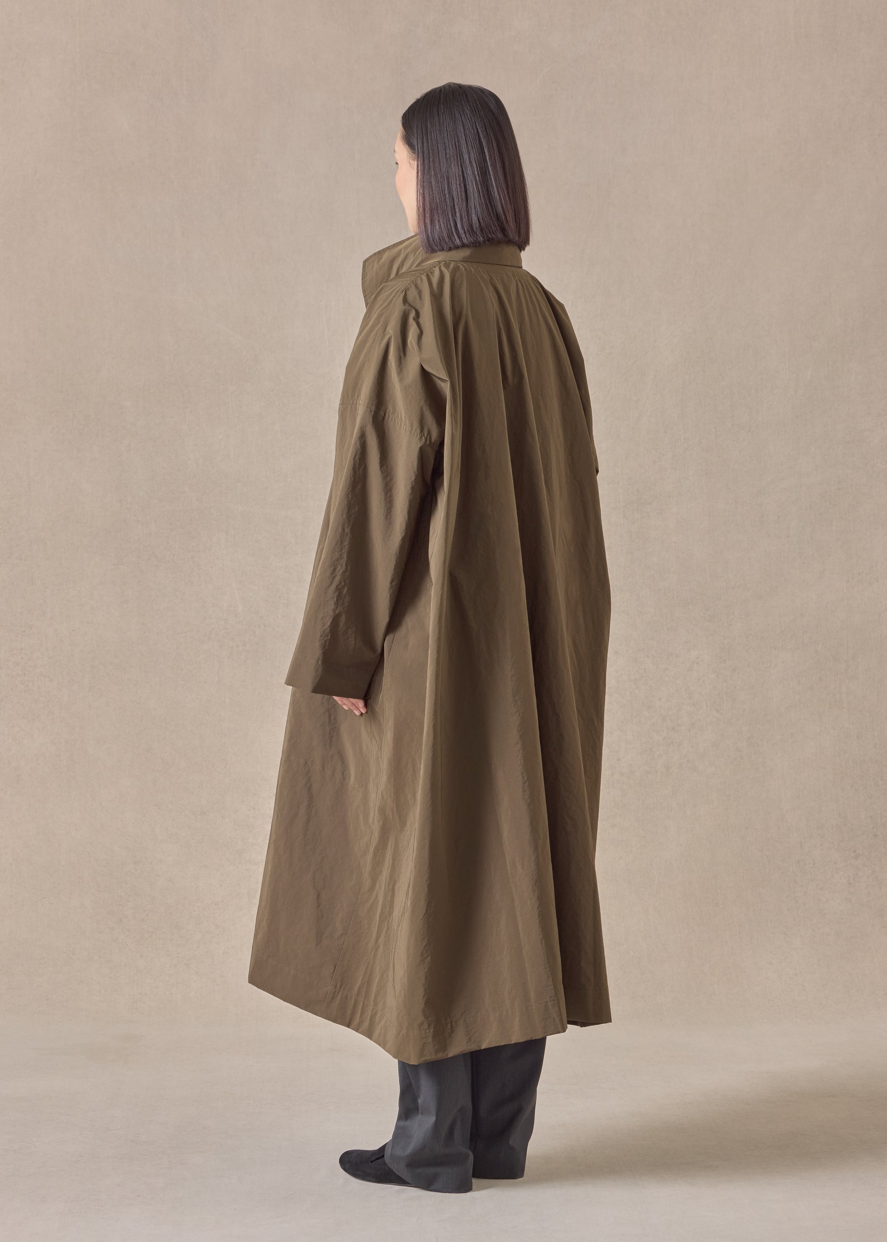 cotton mix smaller front larger back high neck coat with button away hood - full length