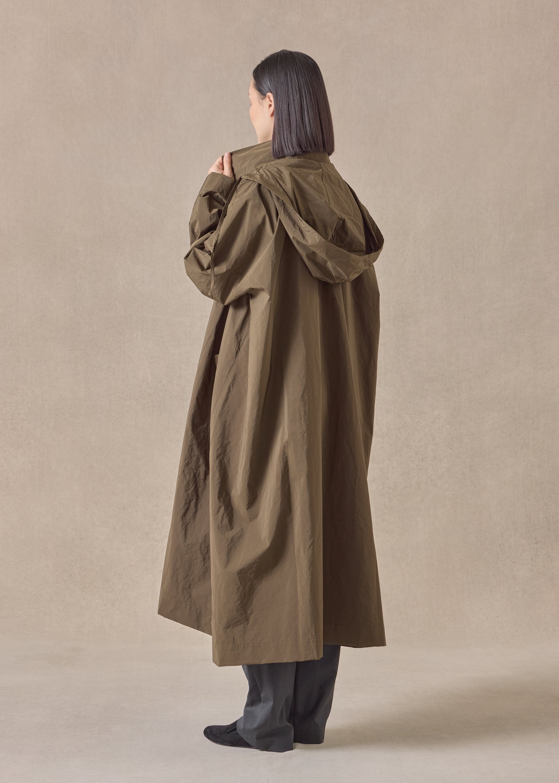 cotton mix smaller front larger back high neck coat with button away hood - full length