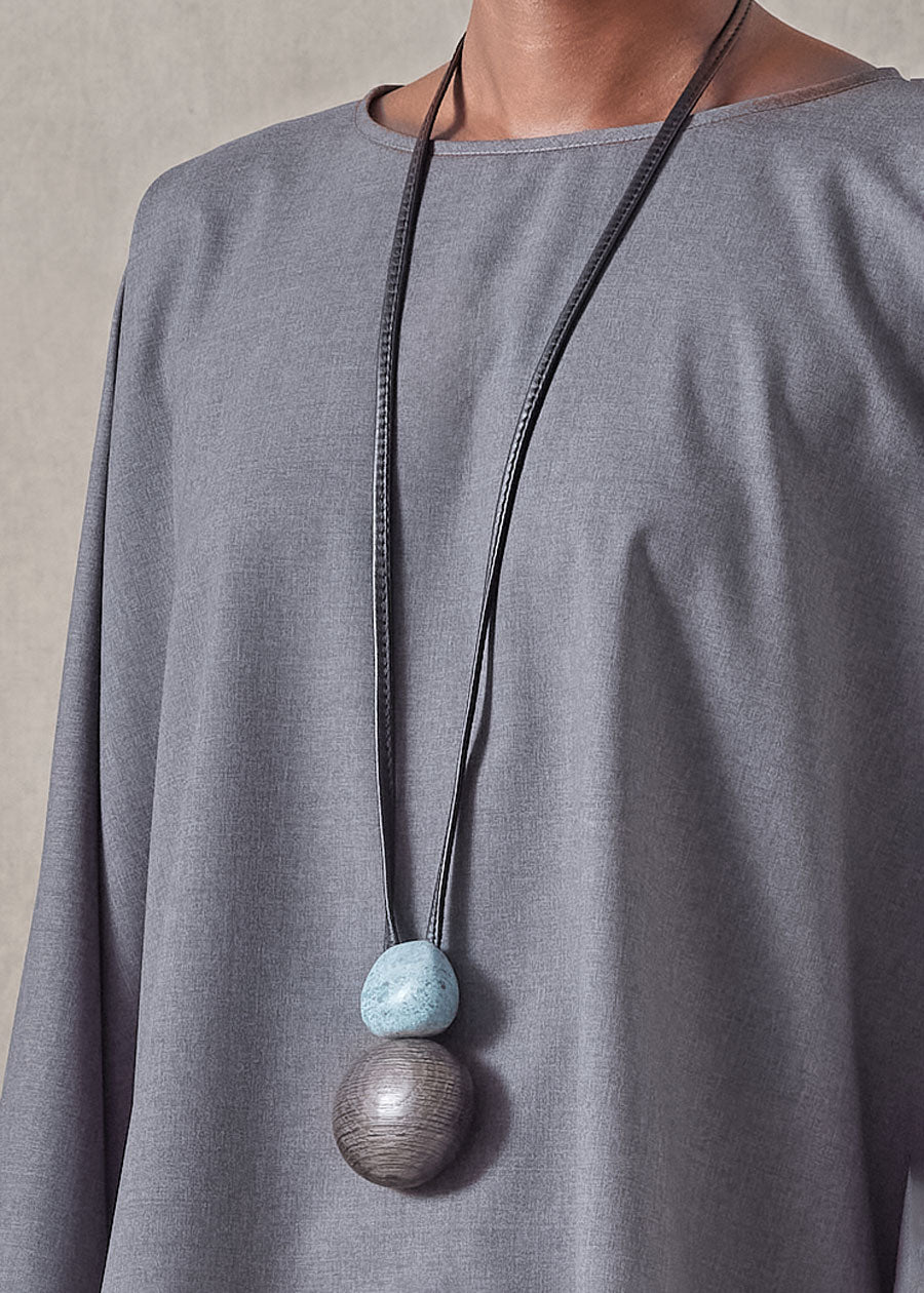 blue apatite gemstone and bog oak pendant