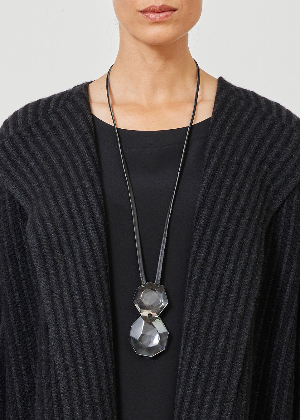 spherical two part faceted clear pendant