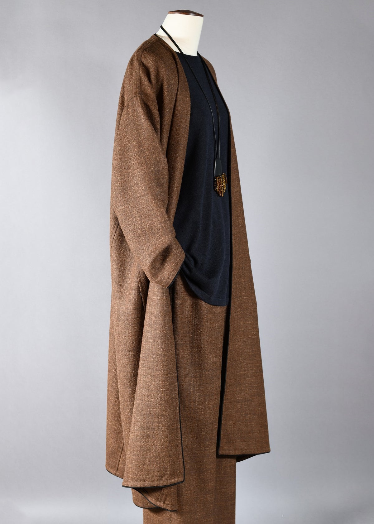 a-line side panelled v-neck coat with piped edge