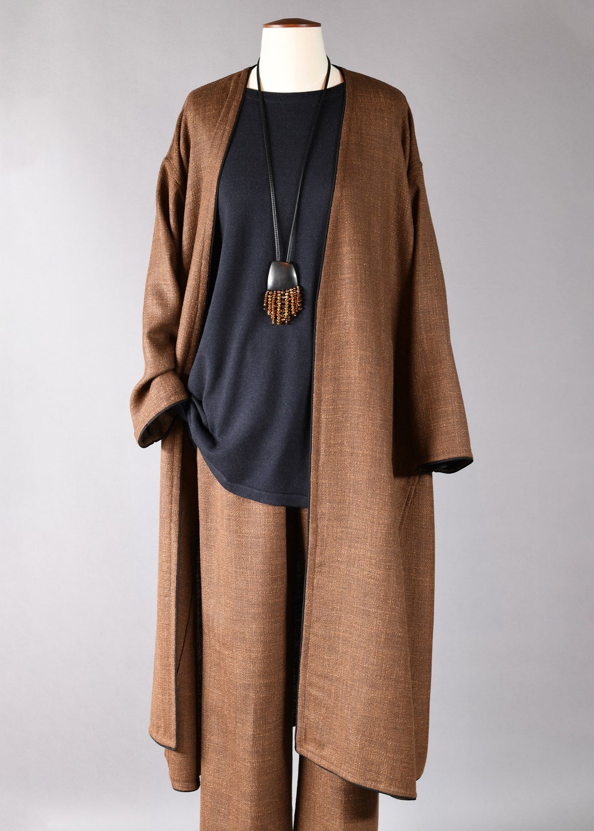 a-line side panelled v-neck coat with piped edge