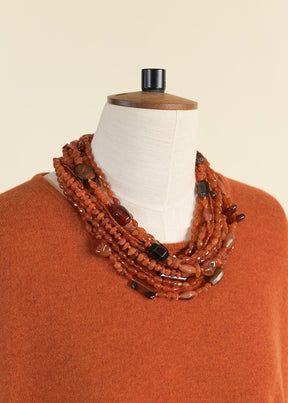 a-line bateau neck knit dress with pleated panels