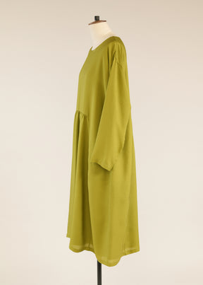 silk a-line round neck dress with 'pleated panels'