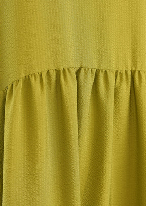 silk a-line round neck dress with 'pleated panels'