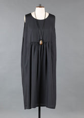 silk sleeveless round neck dress with 'pleated panels'