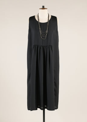 silk sleeveless round neck dress with 'pleated panels'