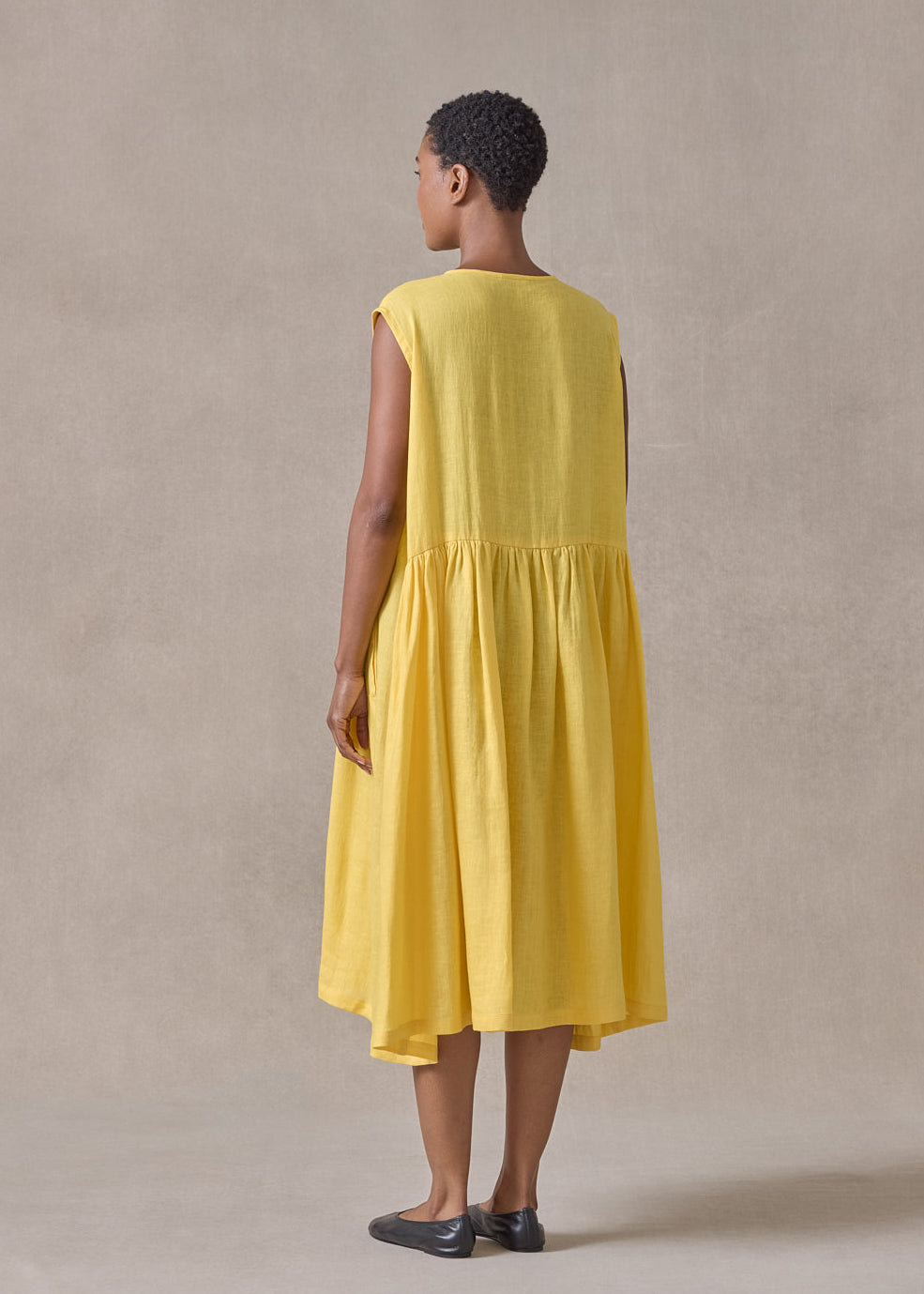 handkerchief linen sleeveless bounded neck shirt dress with full pleat panels (sunshine)