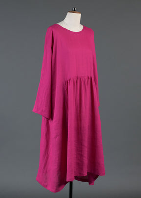 linen A-line round neck dress with pleated panels in lipstick