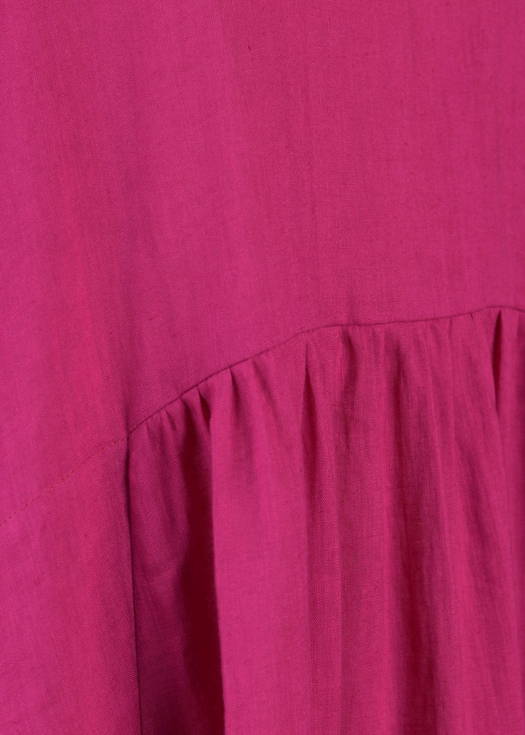 linen A-line round neck dress with pleated panels in lipstick