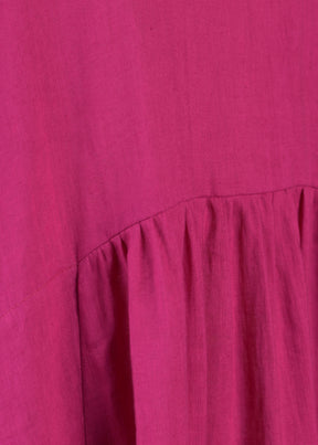 linen A-line round neck dress with pleated panels in lipstick