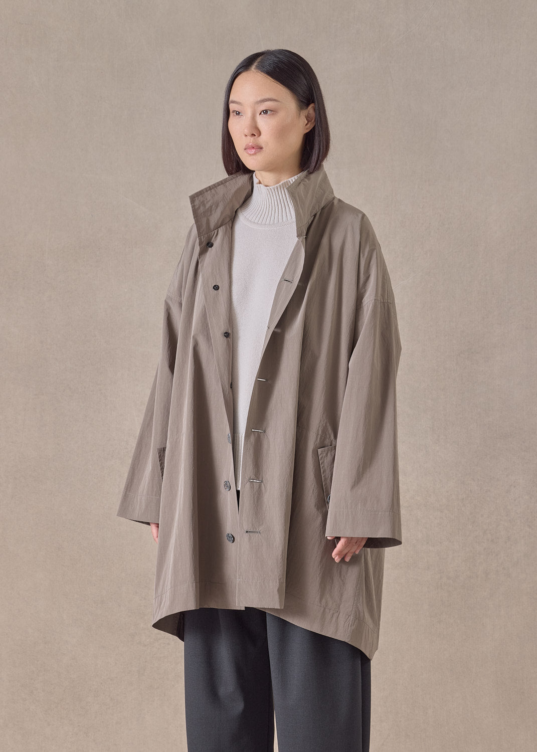 cotton mix smaller front larger back high neck raincoat with button away hood - long plus (stone)