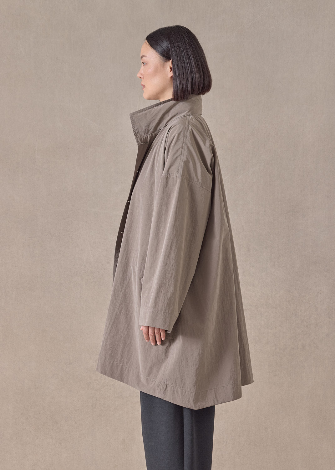cotton mix smaller front larger back high neck raincoat with button away hood - long plus (stone)