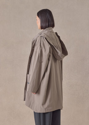 cotton mix smaller front larger back high neck raincoat with button away hood - long plus (stone)