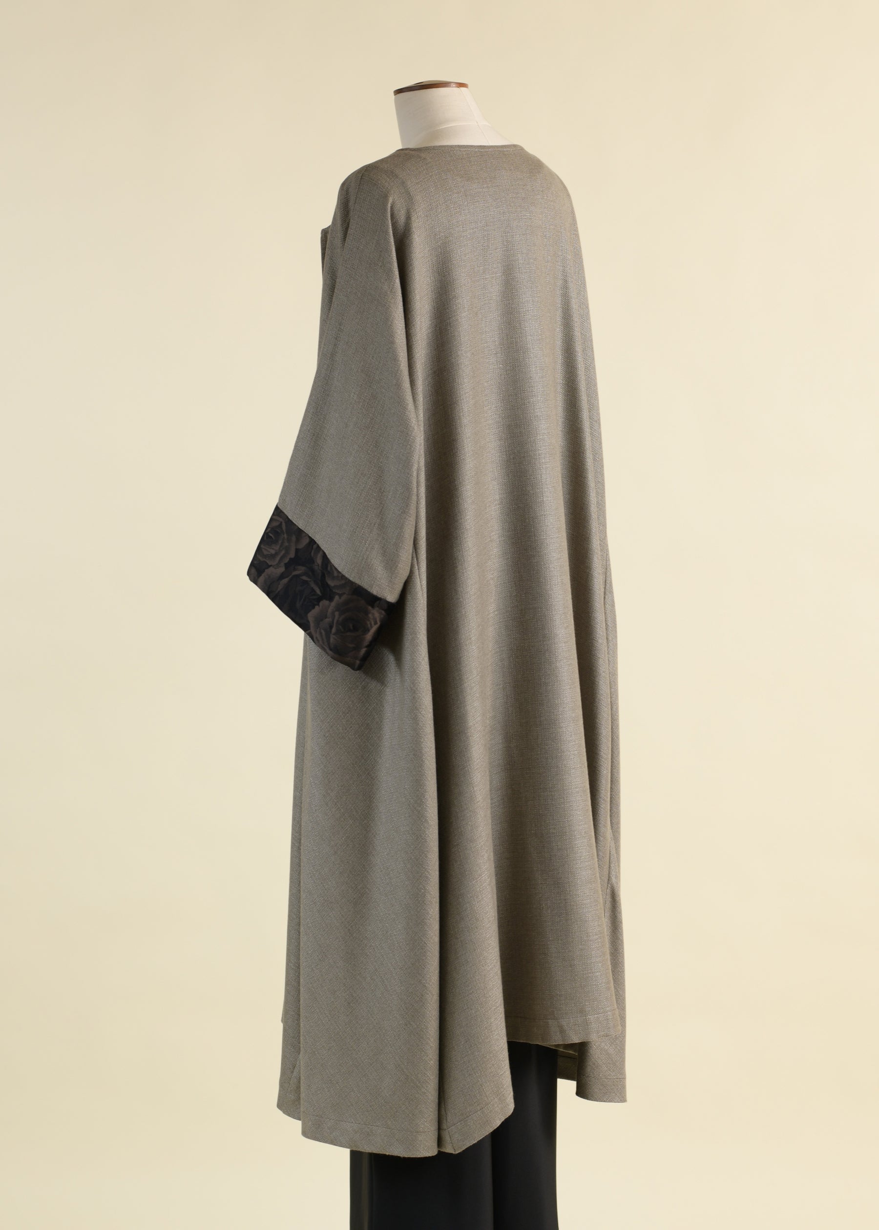 round neck coat with bias side panel and cuff detail