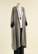 round neck coat with bias side panel and cuff detail