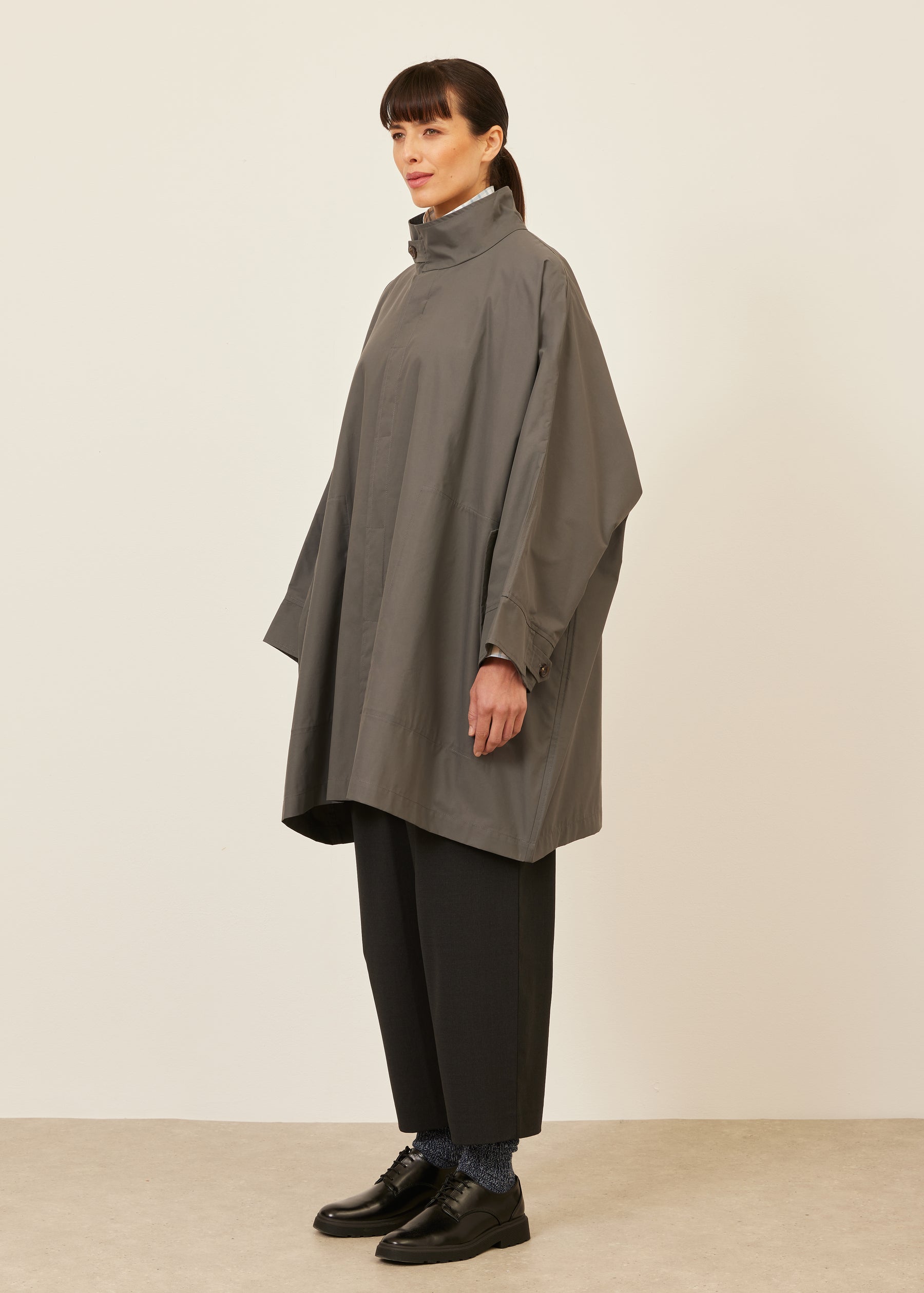 extra wide sloped shoulder raincoat with tabs - very long