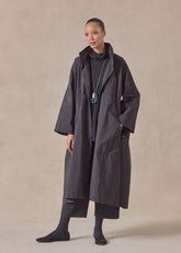 cotton mix smaller front larger back high neck coat with button away hood - full length