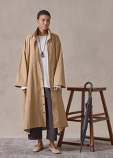 cotton mix smaller front larger back high neck raincoat with button away hood - full length (camel)