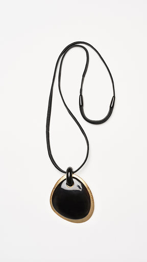 two part elliptical black and gold pendant
