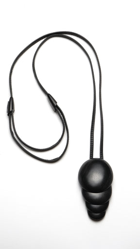 staggered four disc pendant in black