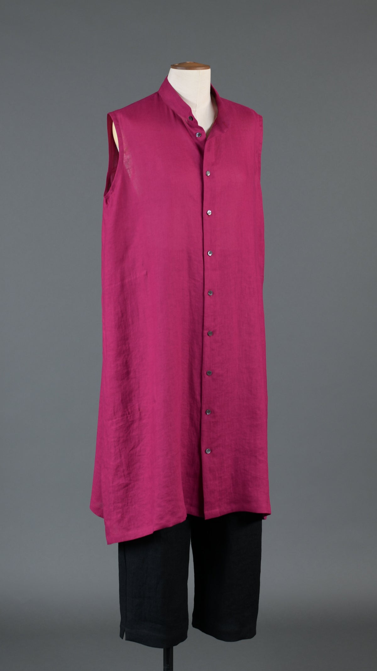 A-line collarless sleeveless shirt dress in magenta