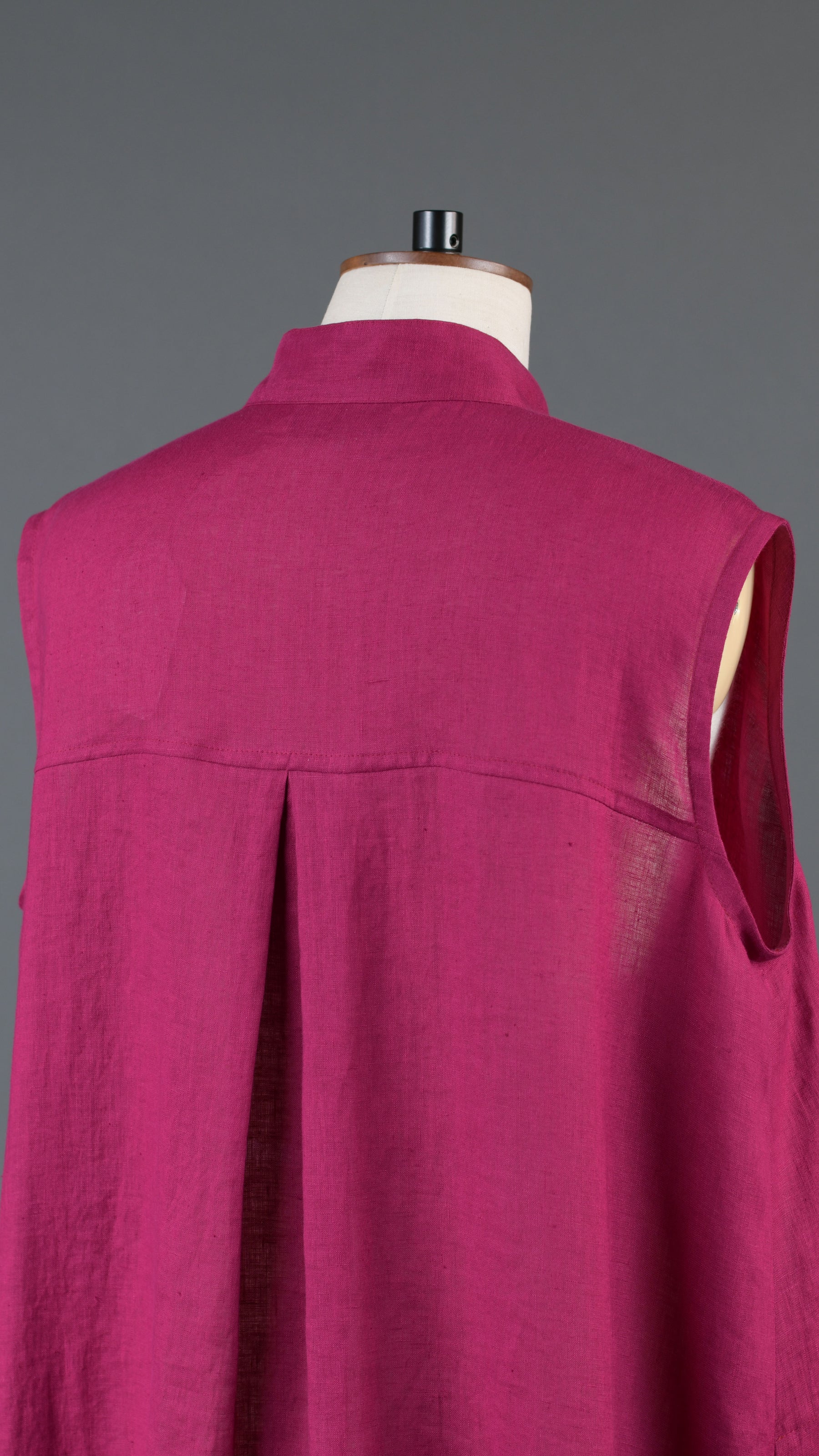 A-line collarless sleeveless shirt dress in magenta