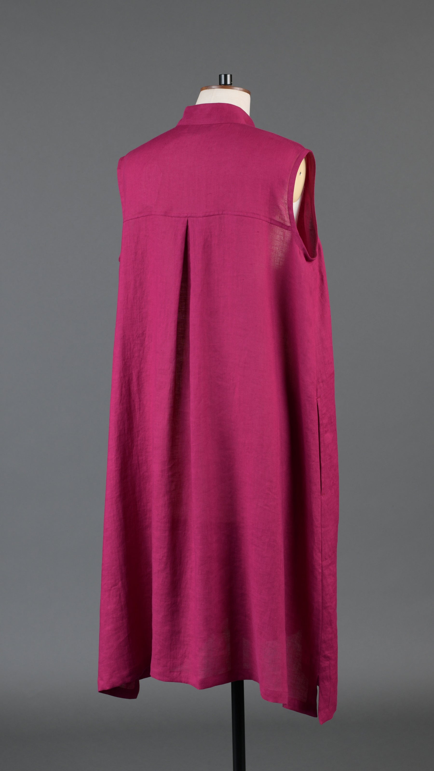 A-line collarless sleeveless shirt dress in magenta
