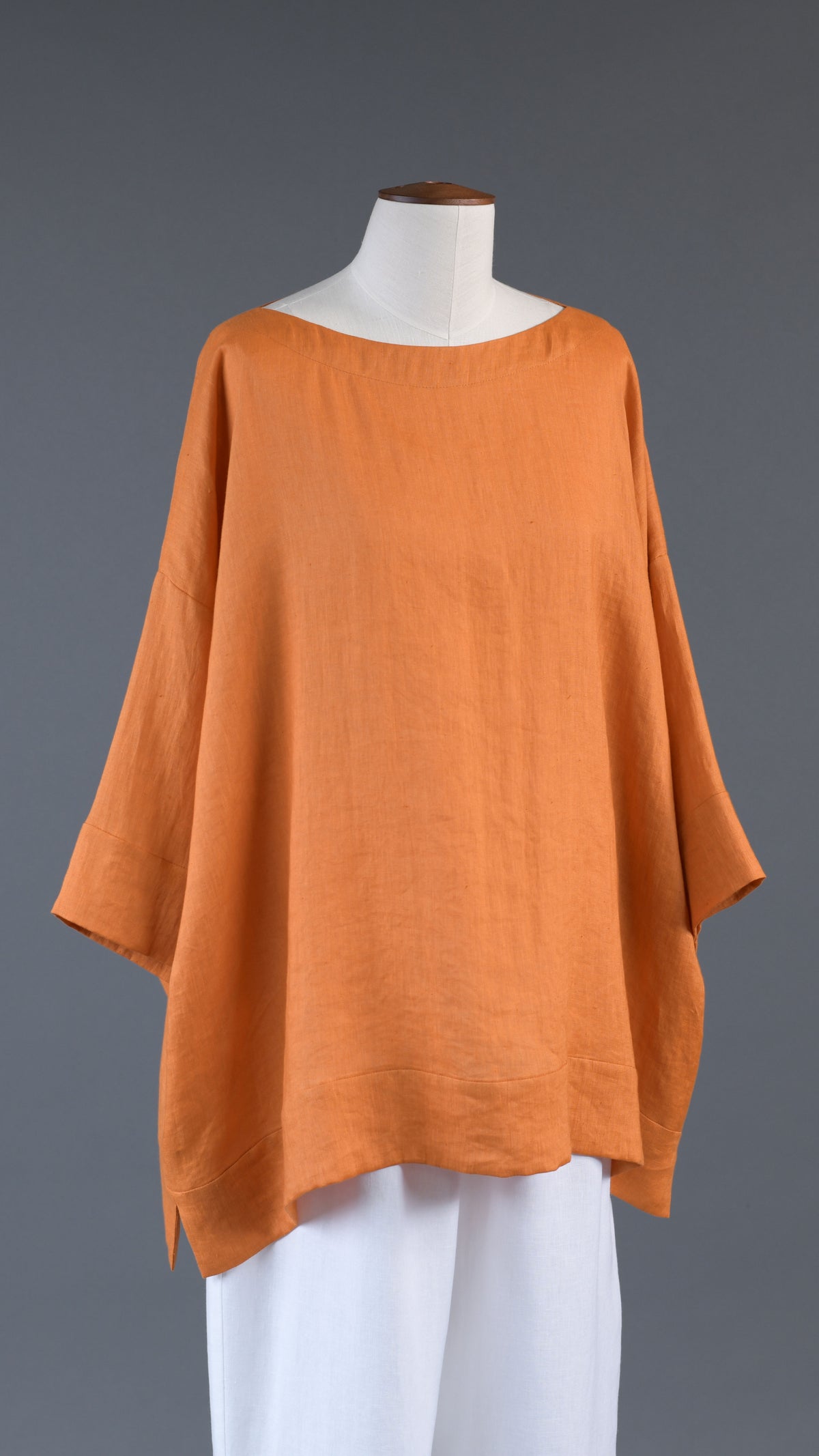 scoop neck 3/4 sleeve top with hem bands - long in amber orange