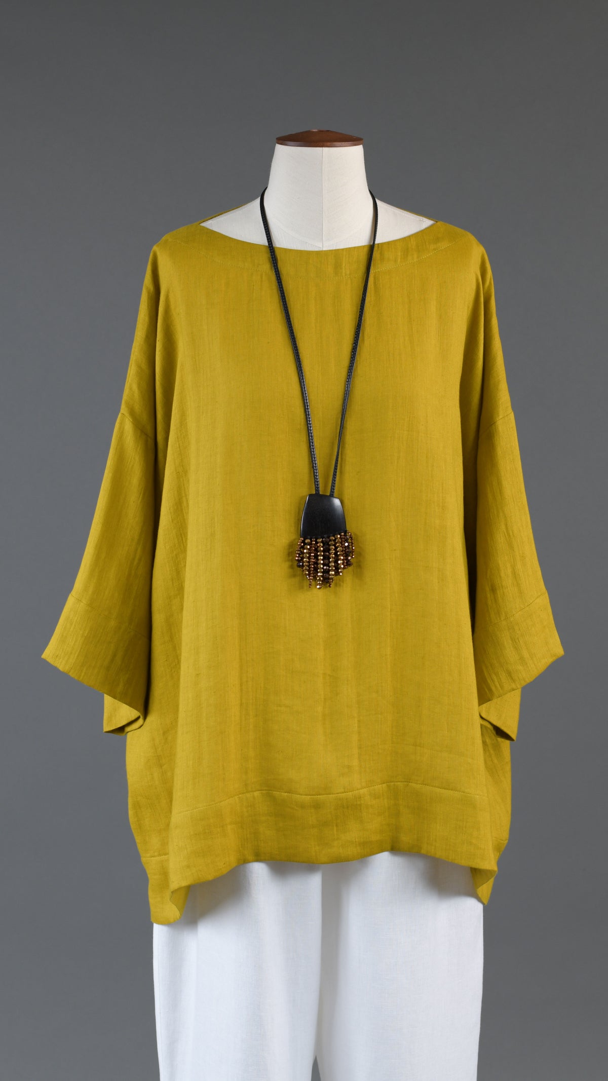 scoop neck 3/4 sleeve top with hem bands - long in dijon