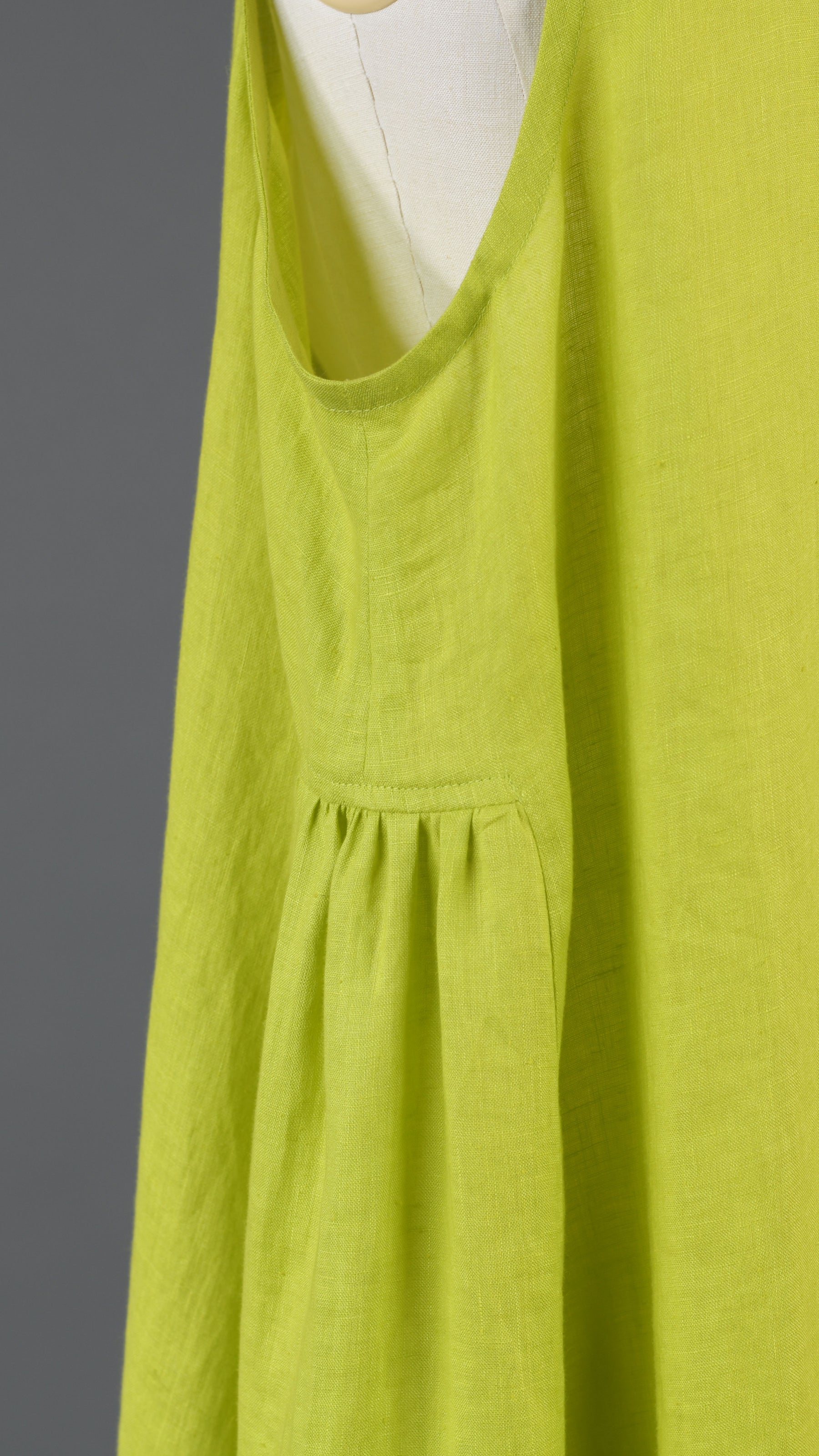 3/4 length side pleated sleeveless dress in greenlemon
