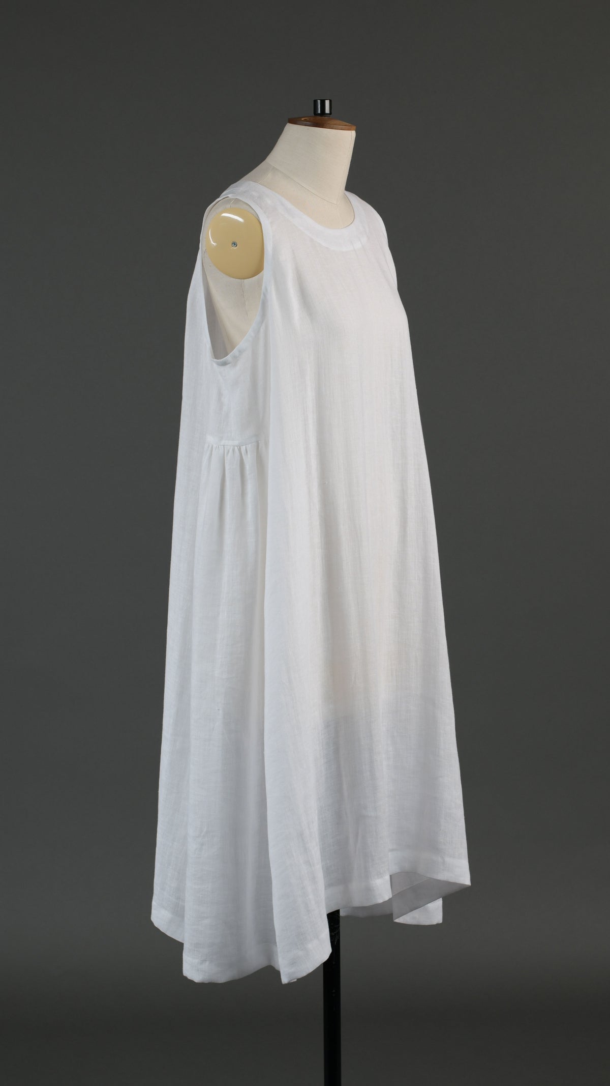3/4 length side pleated sleeveless dress in white