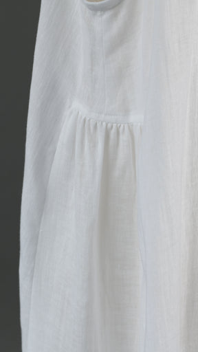 3/4 length side pleated sleeveless dress in white