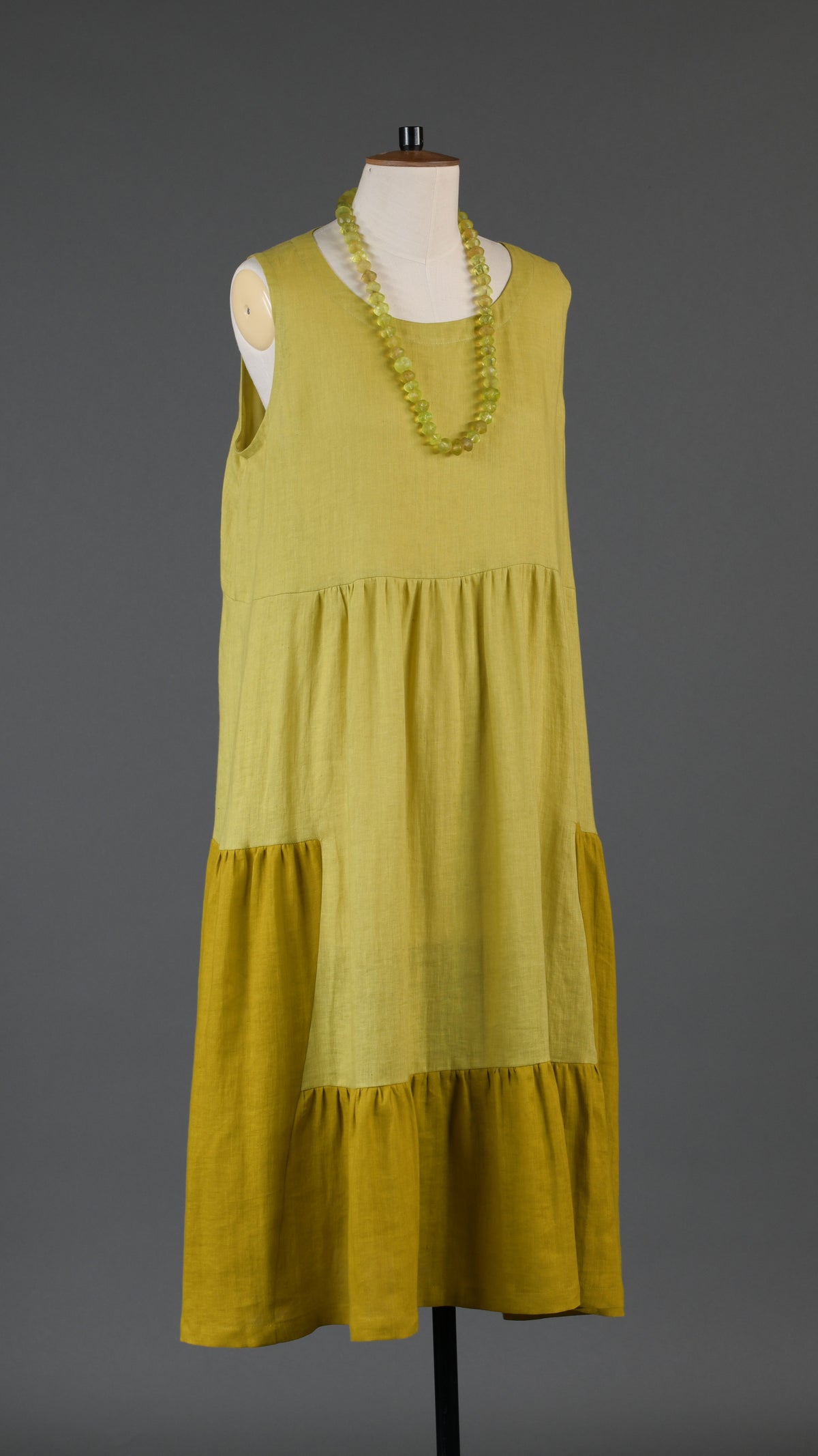 two tone tiered pleated sleeveless dress in dijon mix