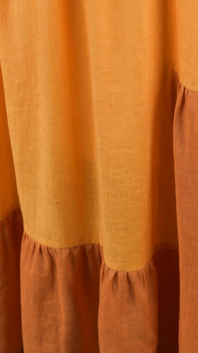 two tone tiered pleated sleeveless dress in orange mix